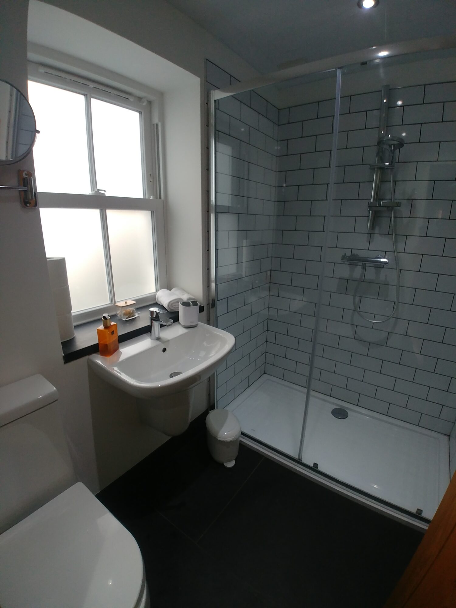 Modern white bathroom with plenty of light