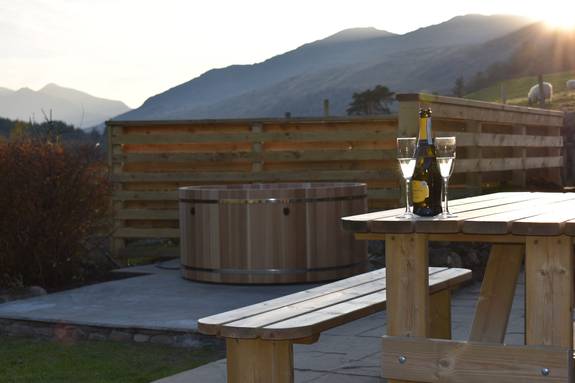 hot tub and Snowdon whilst enjoying a glass of fizz