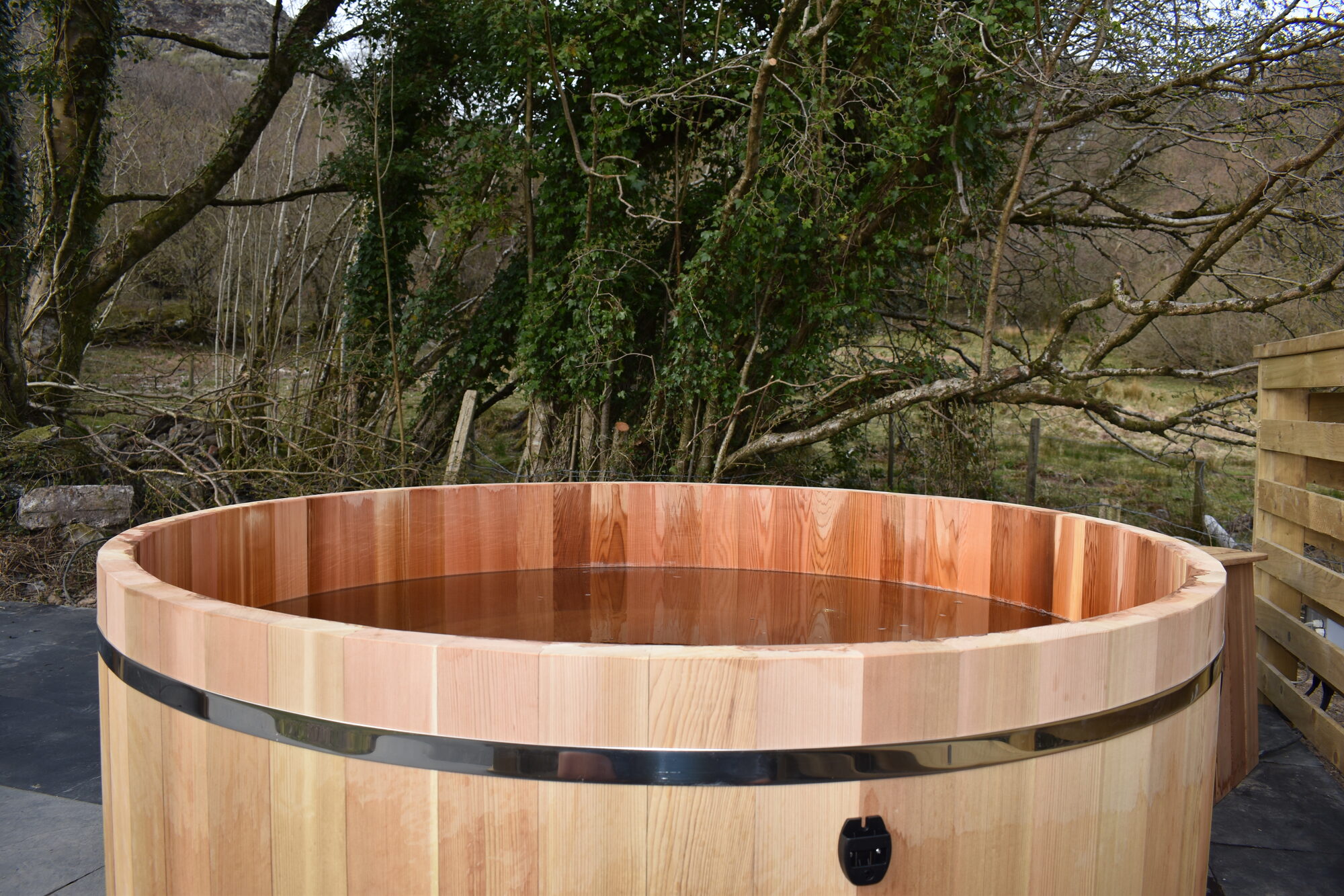 Cedar hot tub with countryside views